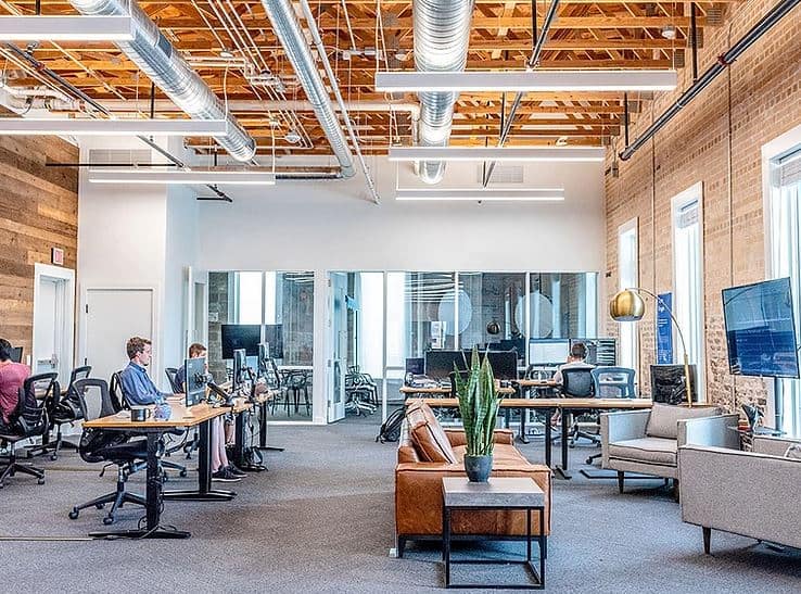 Modern open-plan commercial workspace cleaned by CMS